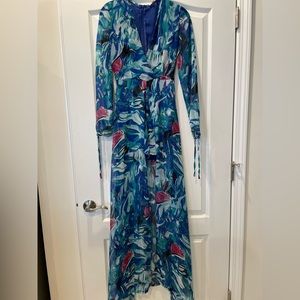 Floral shorts jumpsuit. Size small. New
